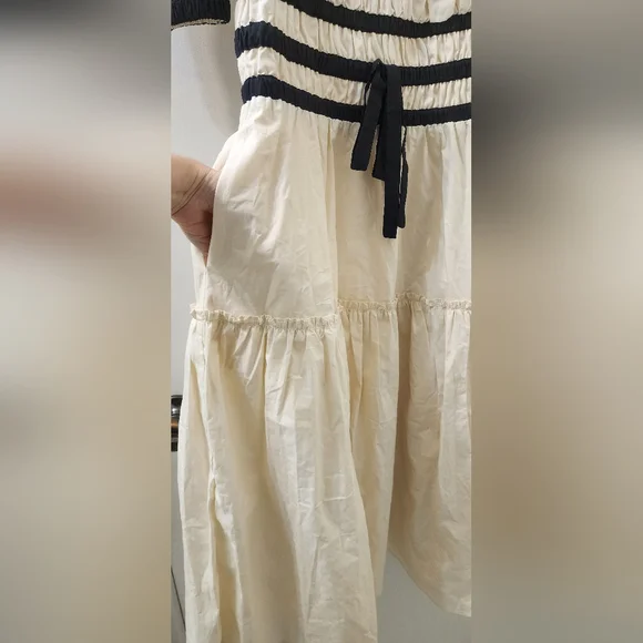 Aureum Elegant Cream Dress with Black Accents - Picture 11 of 11